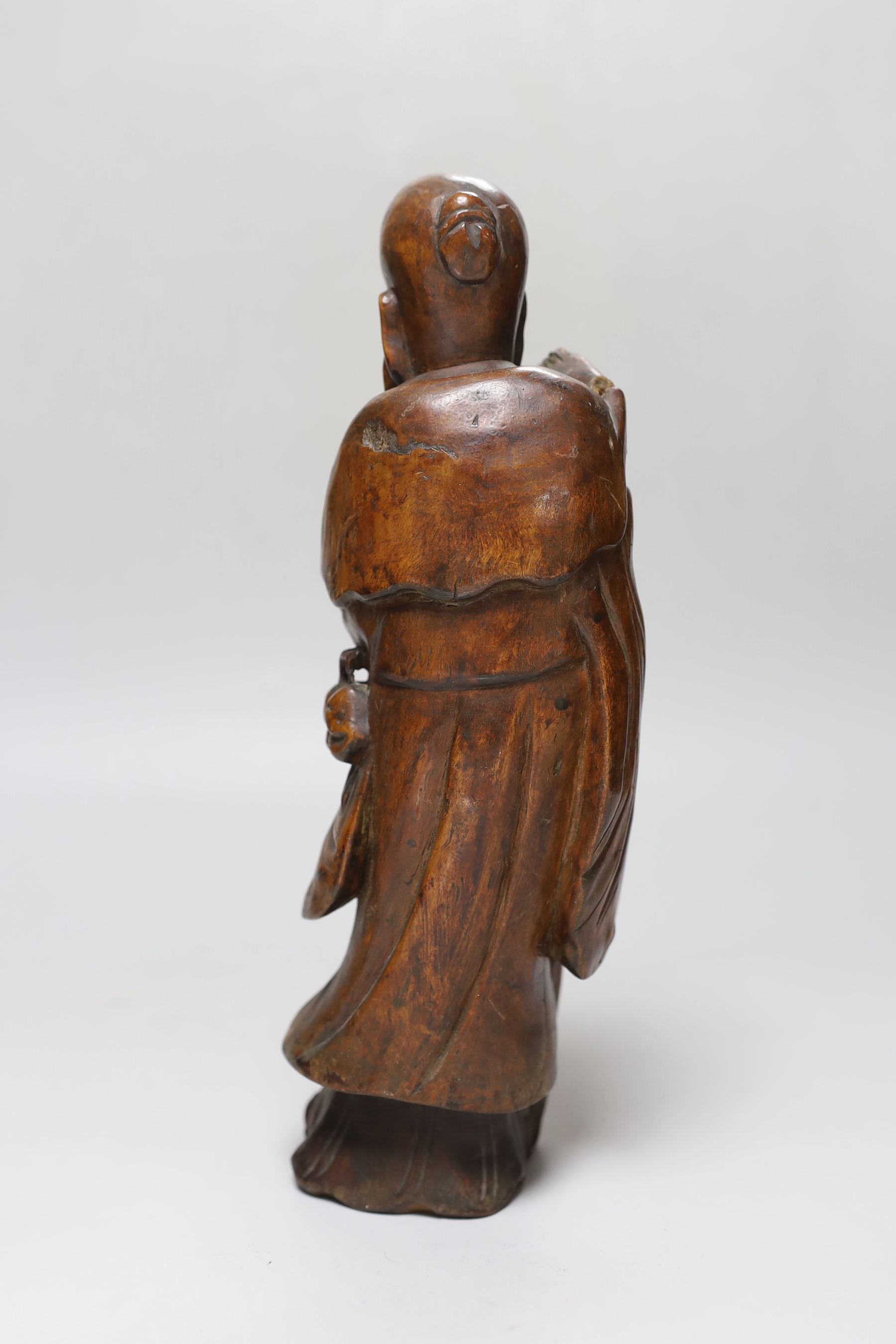 A Chinese hardwood figure of Shou Lao, early 20th century, 29cm